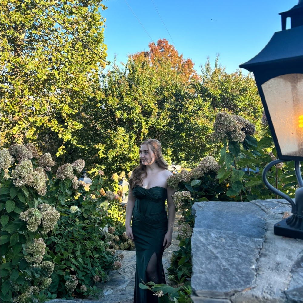 Strapless Emerald green formal dress or gown with leg slit